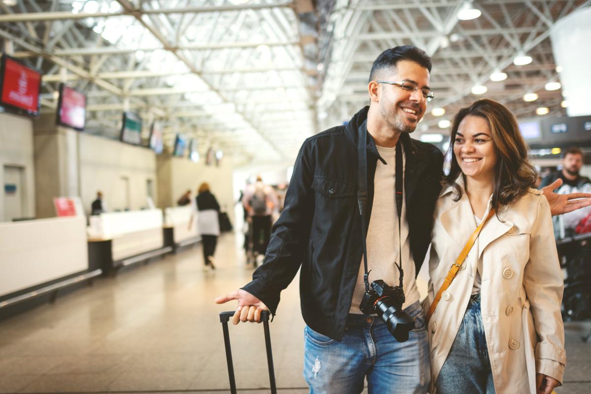 Couple at an airport.